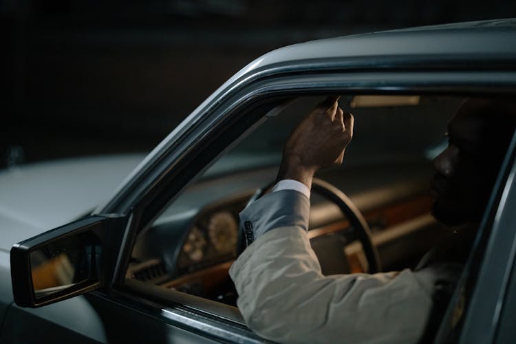 Delivery driver in car - the grind of gig economy work